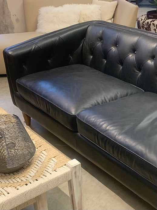 Alcott black tufted leather sofa