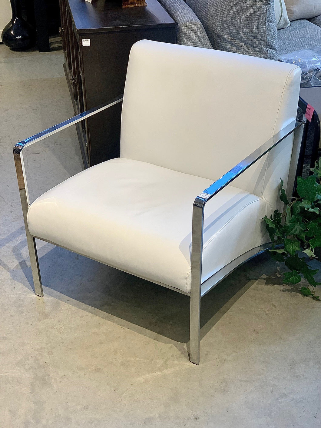 Deco style white leather chair by Industrial Revolution