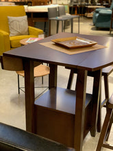 Small space savvy dining with drop leaves and 2 stools!