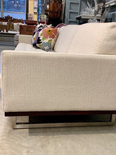 Deco styled fabric sofa with metal base by American Leather
