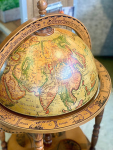 Vintage brown world globe bar with wheels
