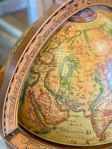 Vintage brown world globe bar with wheels