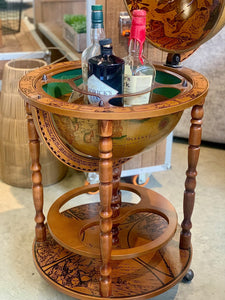 Vintage brown world globe bar with wheels