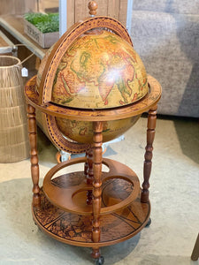 Vintage brown world globe bar with wheels