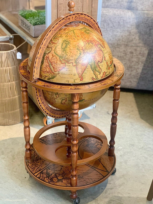 Vintage brown world globe bar with wheels