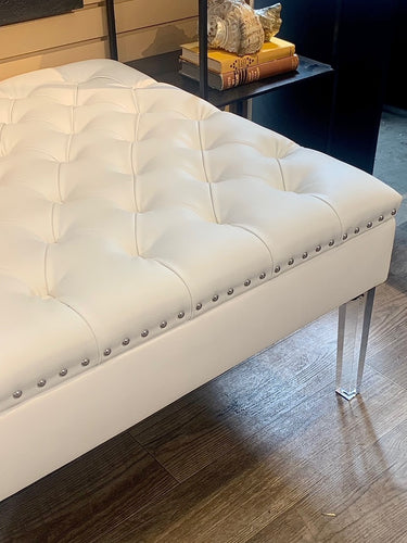 White tufted modern square ottoman with acrylic legs