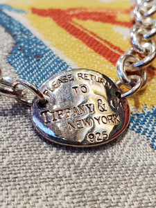 Oval Style Pendant on Chain with "Please return to Tiffany & Co. New York"