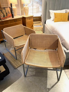 Armed wicker occasional chair