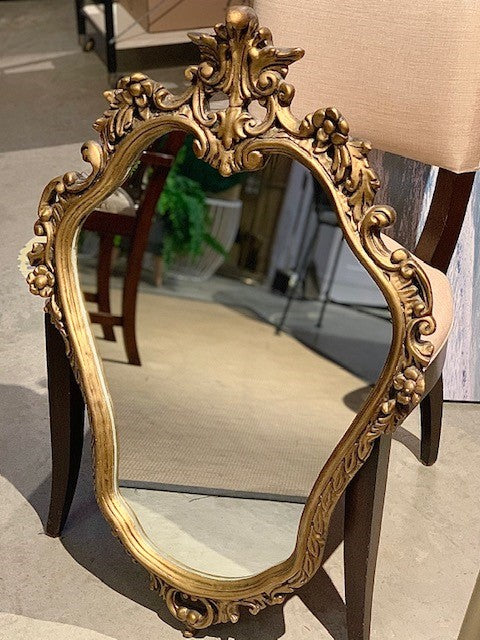 Gold Victorian style mirror