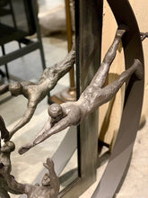 "Reaching for the stars" bronze figure
