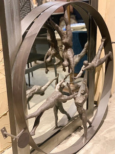 "Reaching for the stars" bronze figure