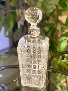 Stunning crystal decanter with silverplate collar